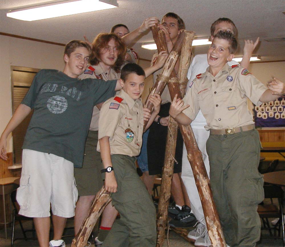 Link to: Larger Image The tripod was actually formed in a way that puts all the stress on the ropes. Instead, the outside legs should cross under the middle leg.