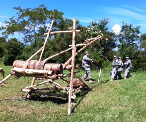 Link to: Larger Image Soldiers play with Large Catapult