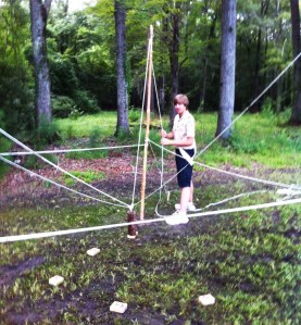 The log is steadied on top of a corner mark.