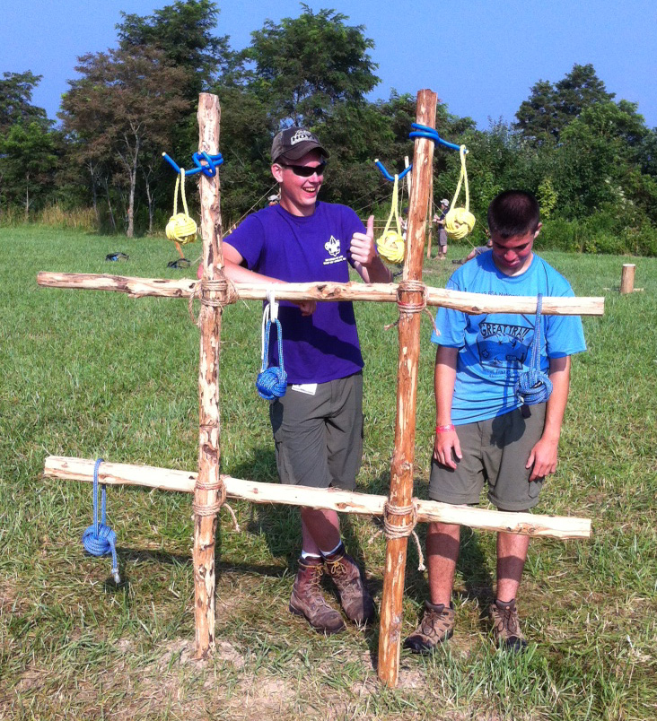 Yellow wins! Two Scouts pose after their tic-tac-toe game.